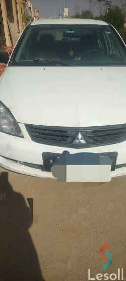 Mitsubishi lancer automatic used white model 2010