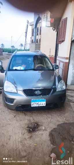 Kia carens automatic used dark gray model 2010