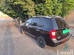 Kia carens automatic used black model 2011