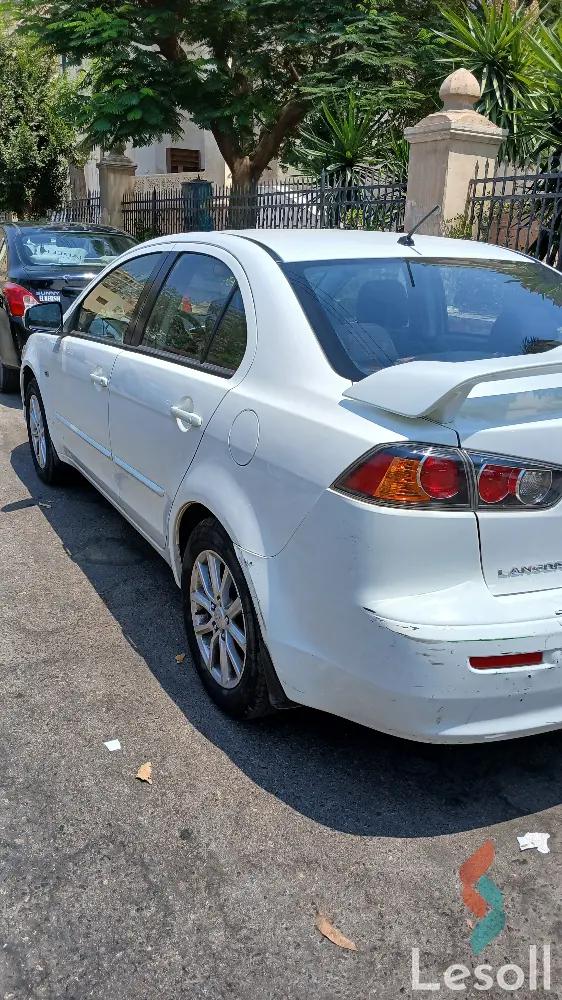 ميتسوبيشي لانسر اوتوماتك مستعملة أبيض موديل 2015