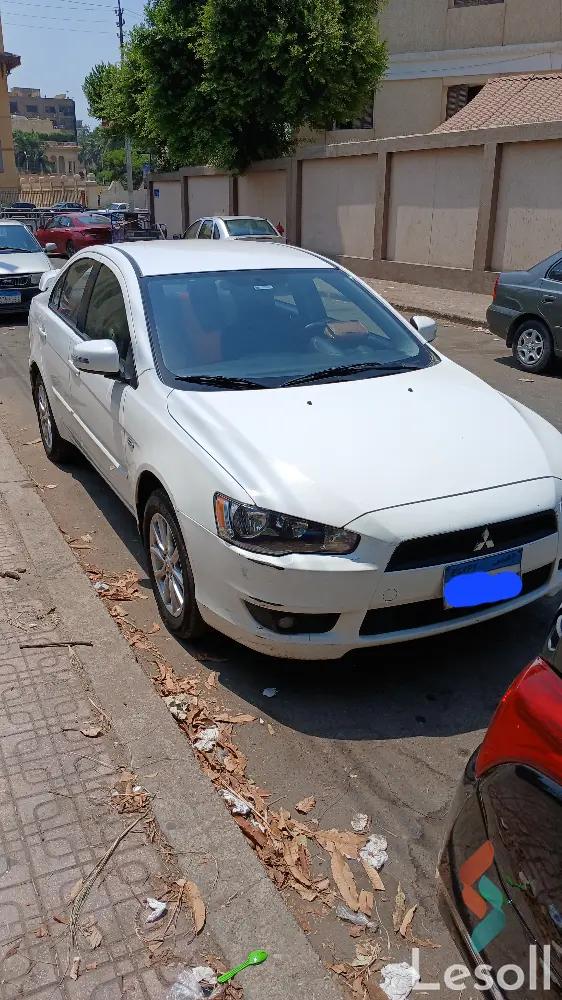 ميتسوبيشي لانسر اوتوماتك مستعملة أبيض موديل 2015