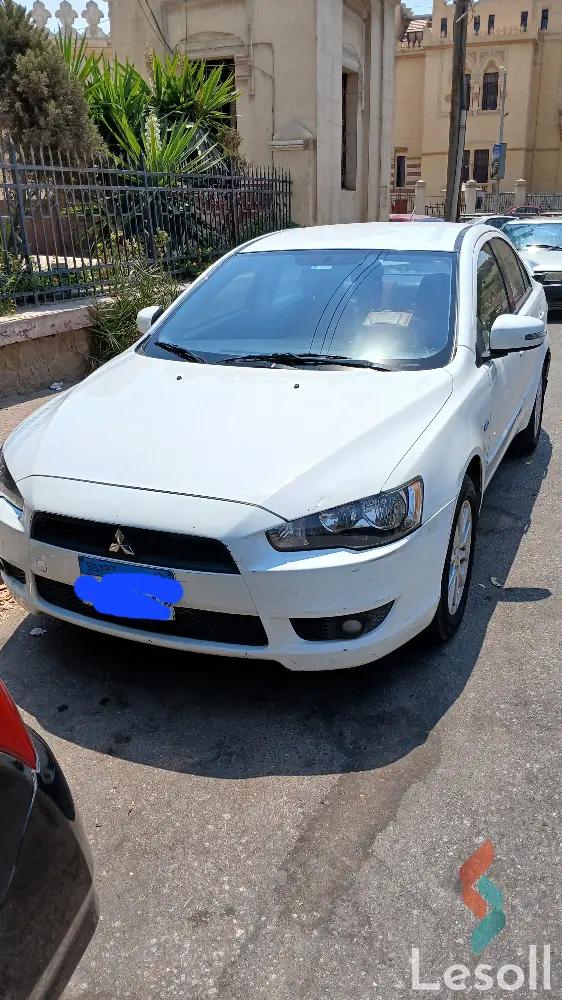 ميتسوبيشي لانسر اوتوماتك مستعملة أبيض موديل 2015