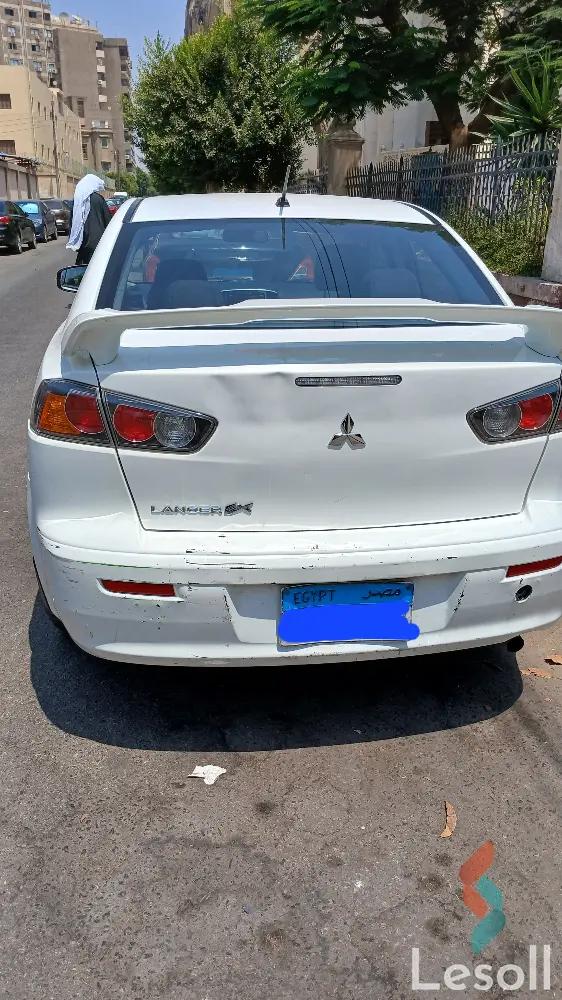 ميتسوبيشي لانسر اوتوماتك مستعملة أبيض موديل 2015