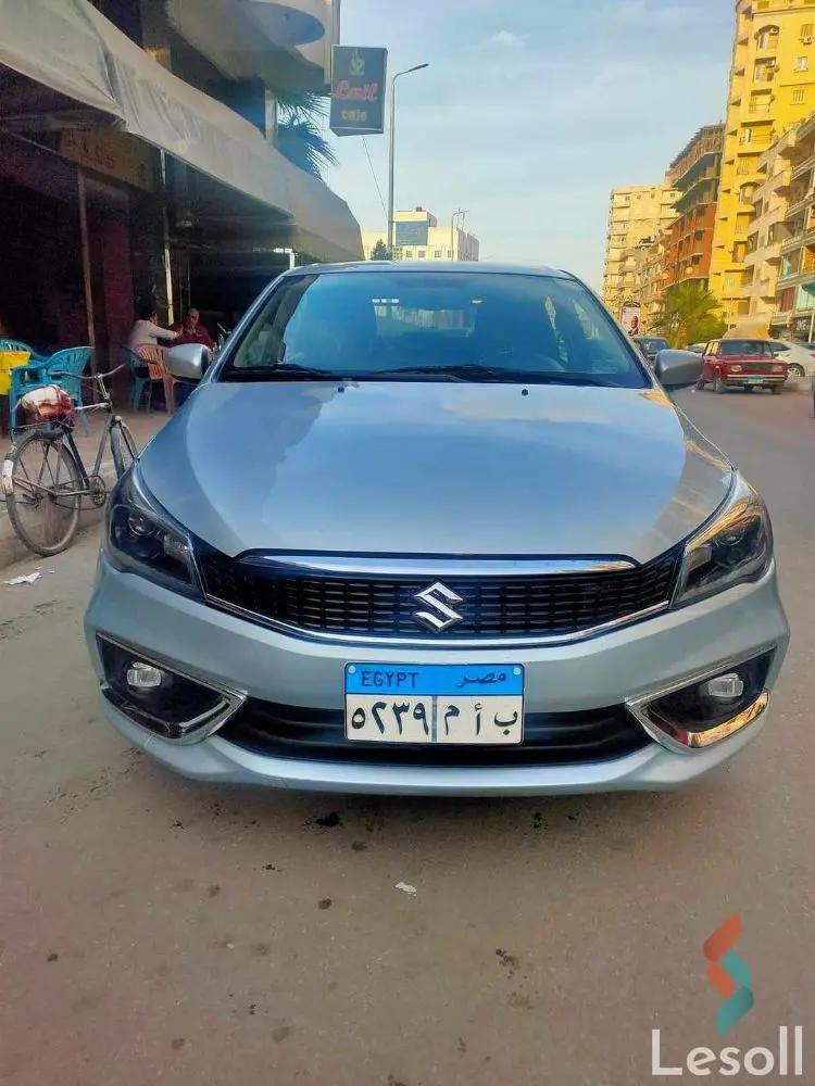 سوزوكي ديزاير اوتوماتك مستعملة فضي موديل 2022 - الصورة الرئيسية