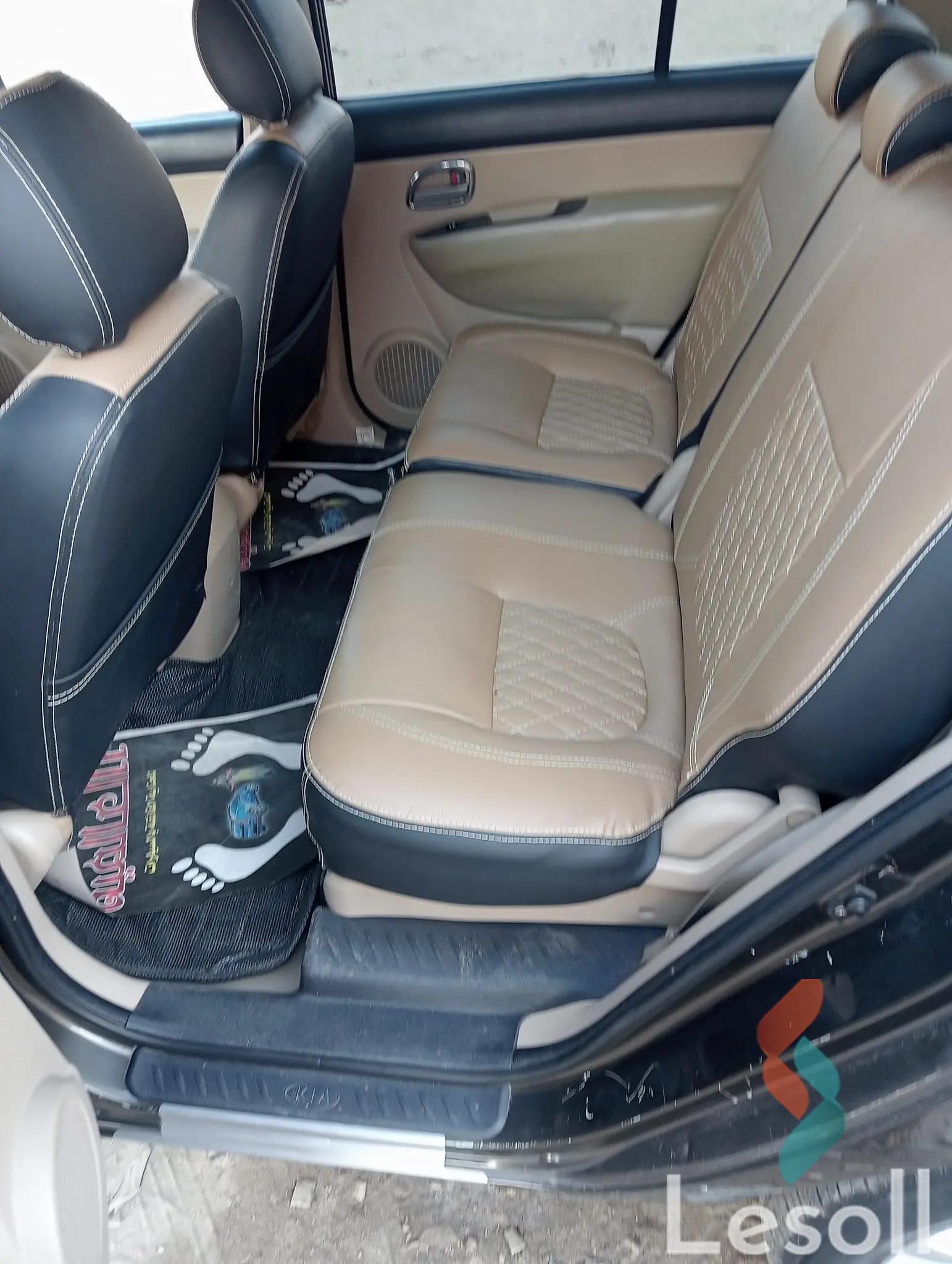 كيا كارينز اوتوماتك جديدة برونزي موديل 2011 - كل الصور