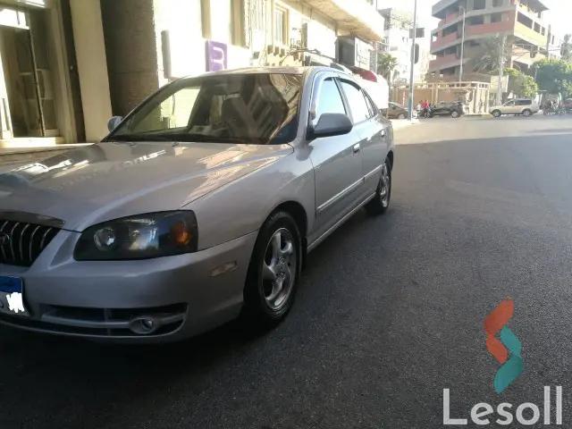 هيونداي إلنترا اوتوماتك مستعملة فضي موديل 2004 - صورة 4