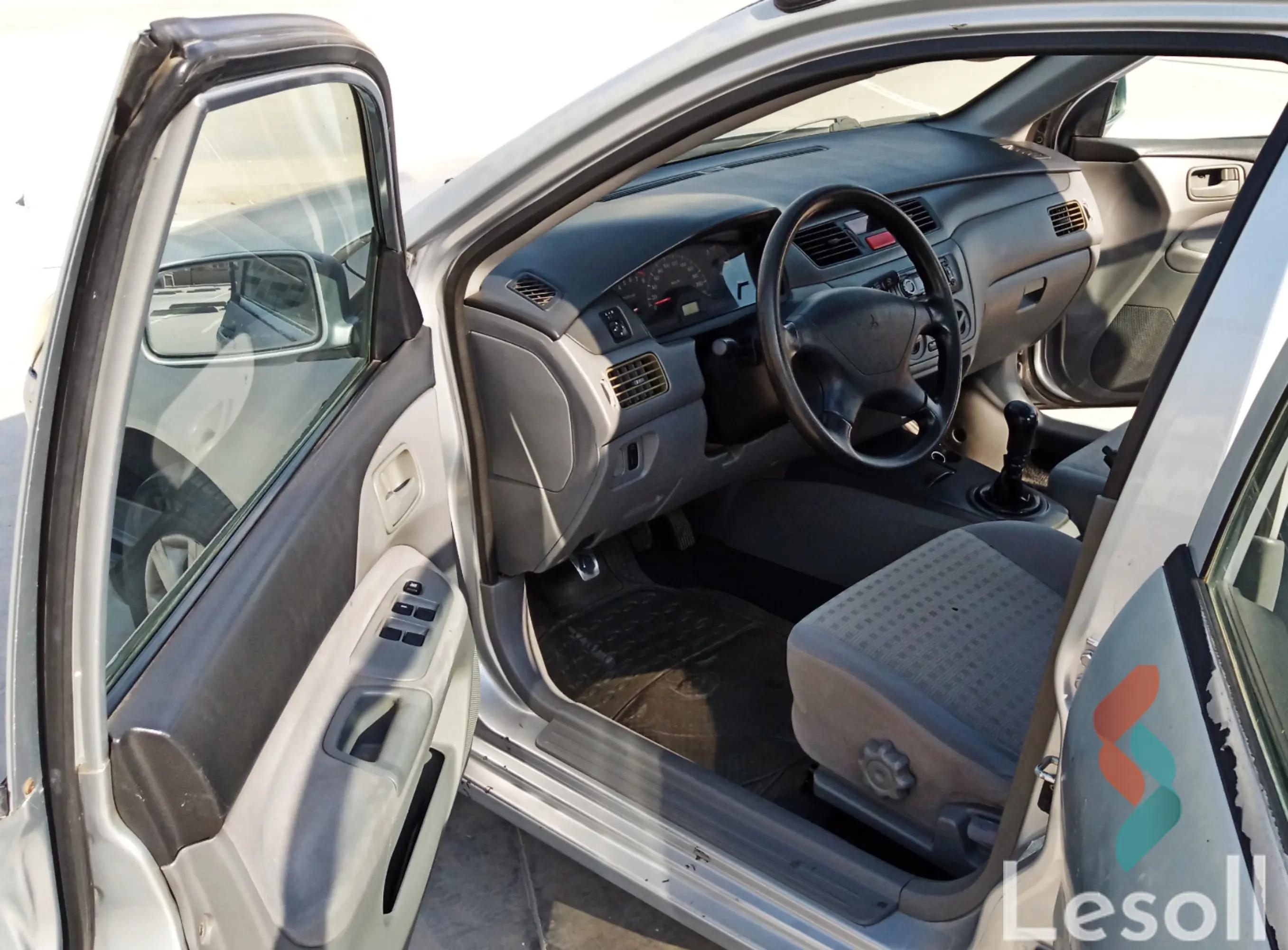 ميتسوبيشي لانسر مانيوال مستعملة فضي موديل 2006 - كل الصور