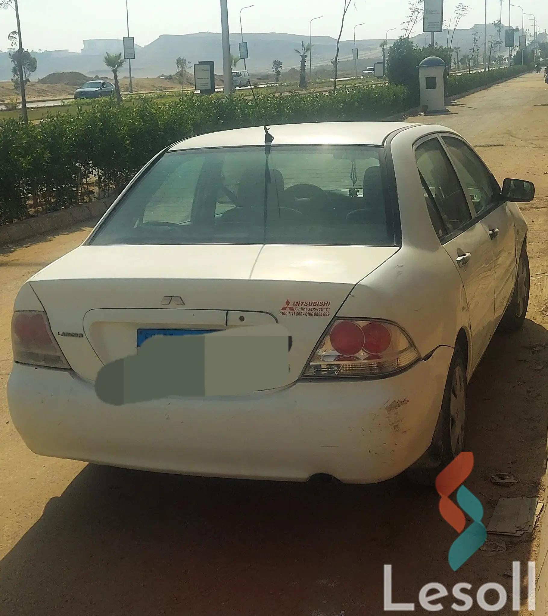 ميتسوبيشي لانسر اوتوماتك مستعملة أبيض موديل 2010