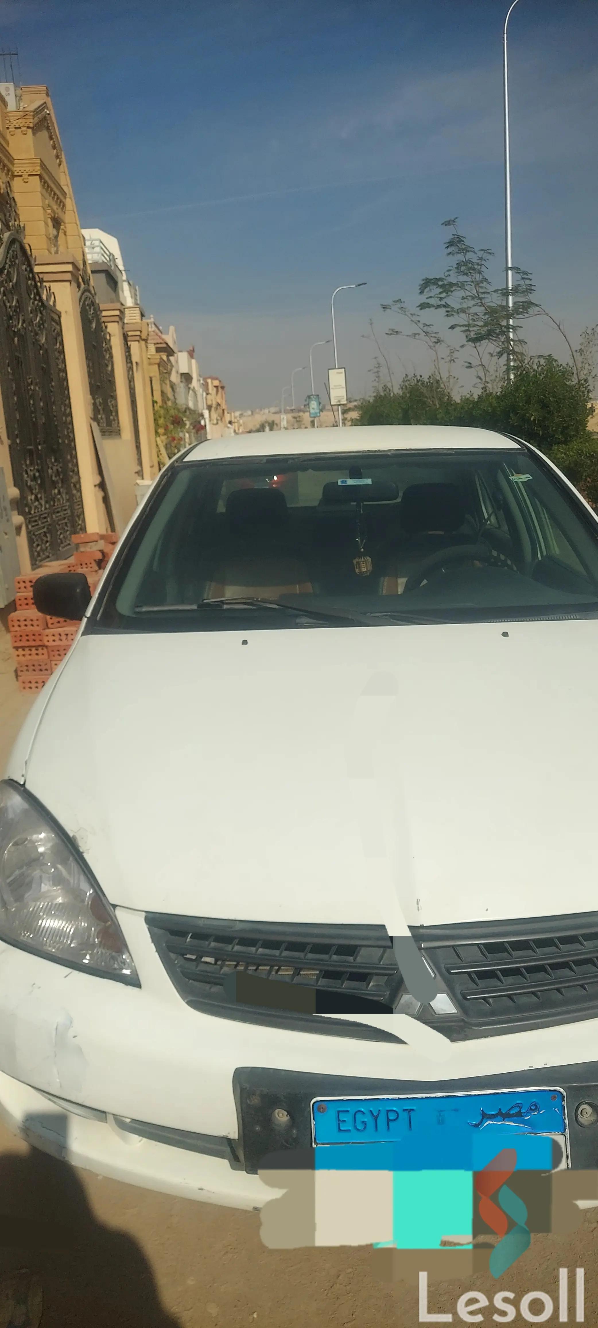 ميتسوبيشي لانسر اوتوماتك مستعملة أبيض موديل 2010 - كل الصور