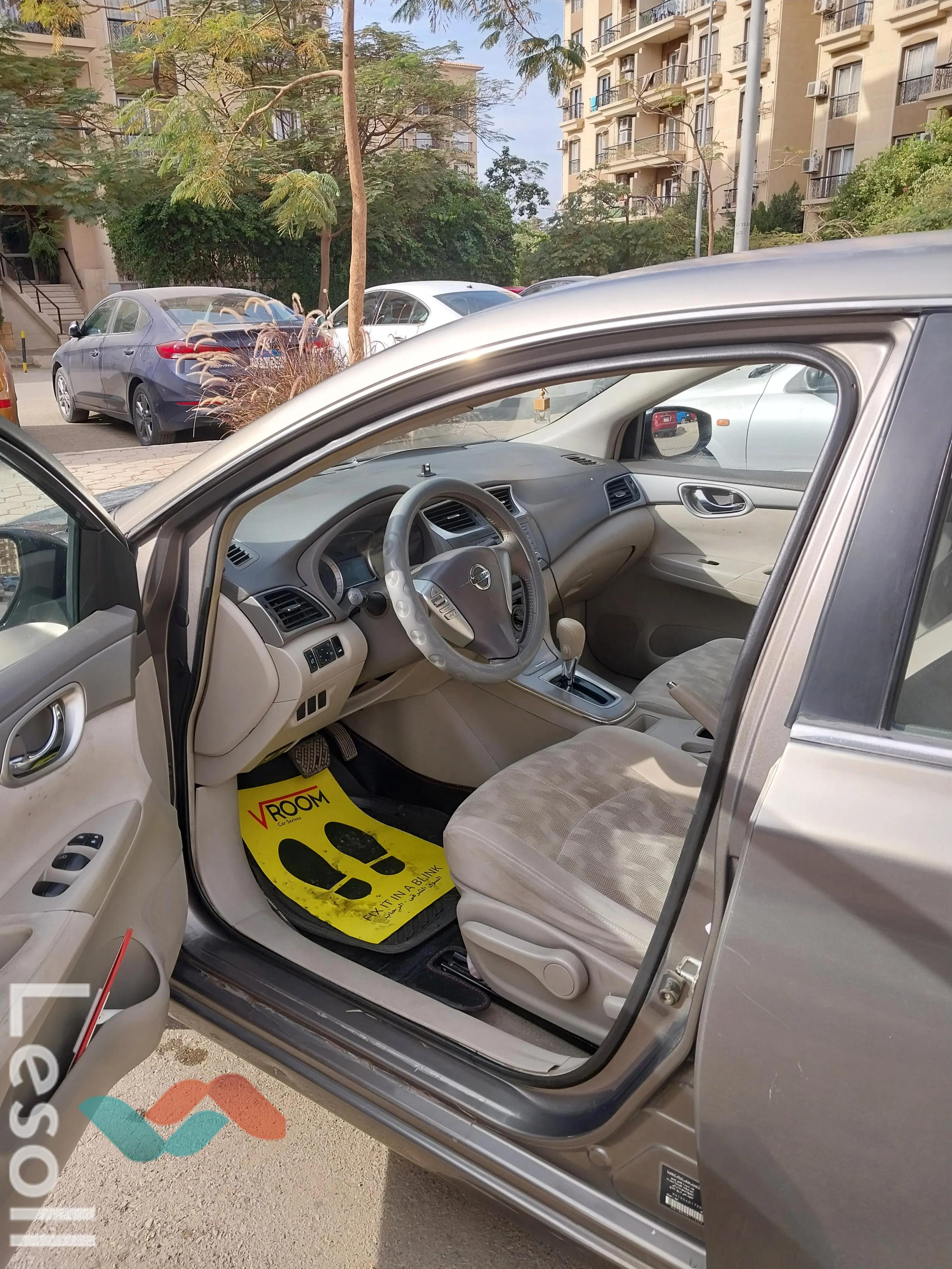 نيسان سنترا اوتوماتك مستعملة فضي موديل 2015 - كل الصور