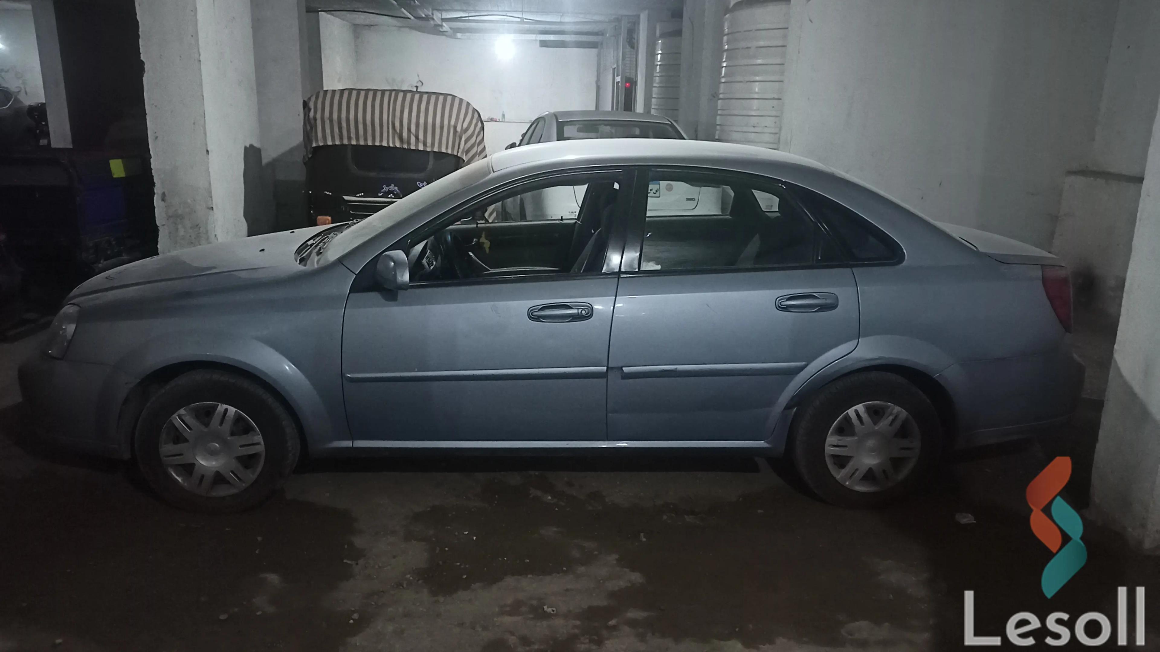 شيفروليه أوبترا مانيوال مستعملة أزرق سماوي موديل 2010 - صورة 2