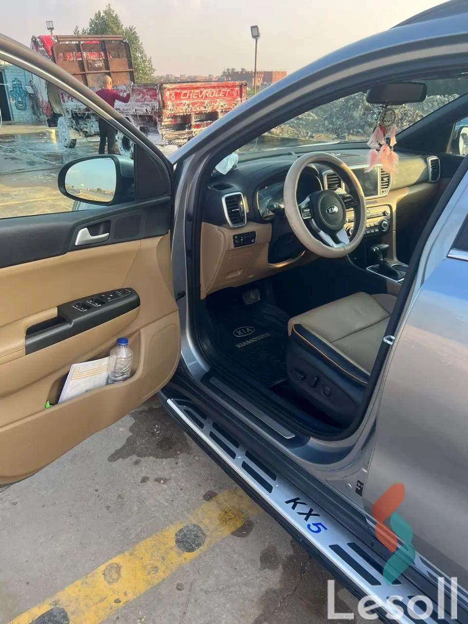 كيا سبورتاج اوتوماتك مستعملة رمادي داكن موديل 2022