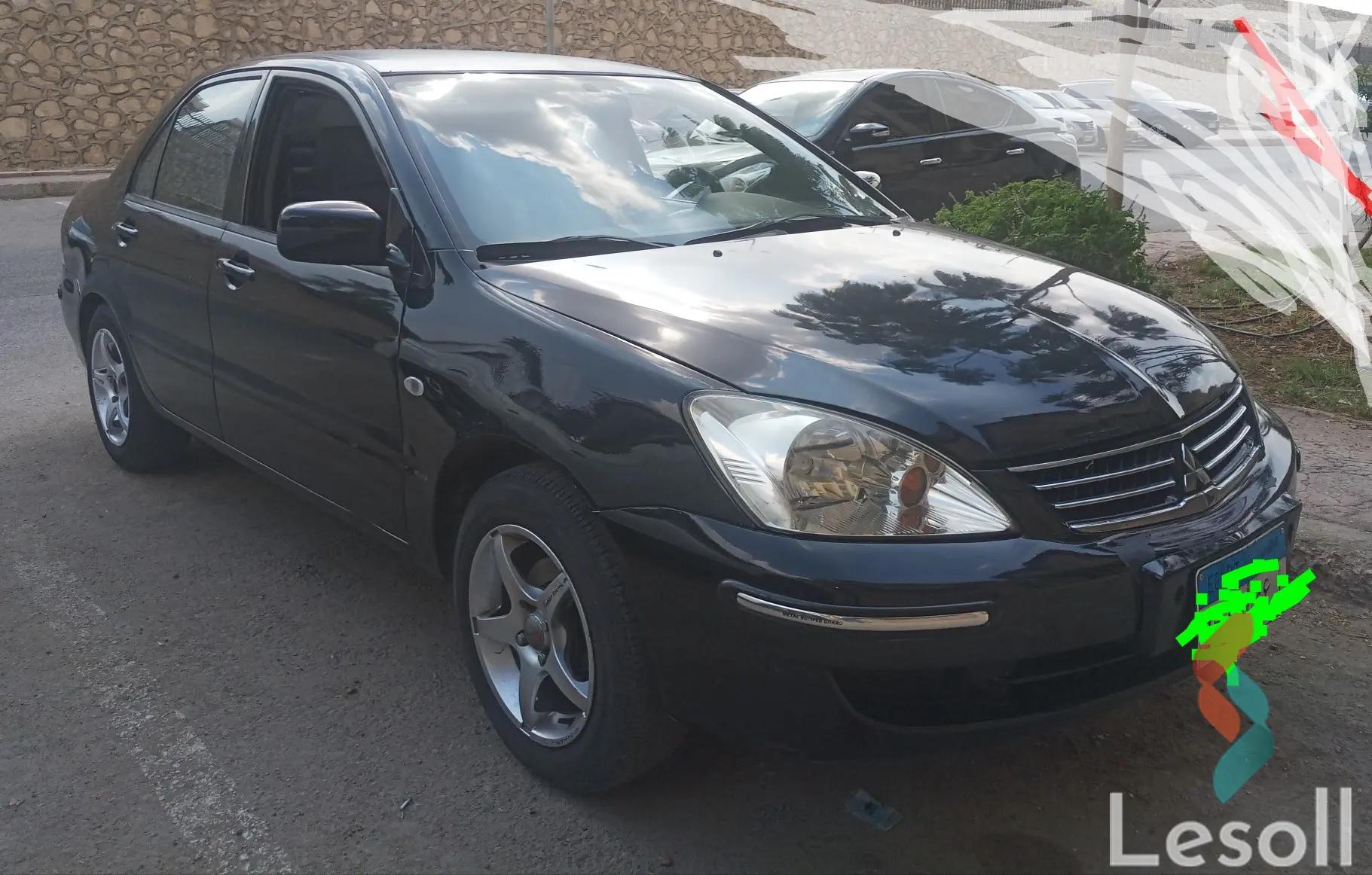 Mitsubishi lancer automatic used black model 2013