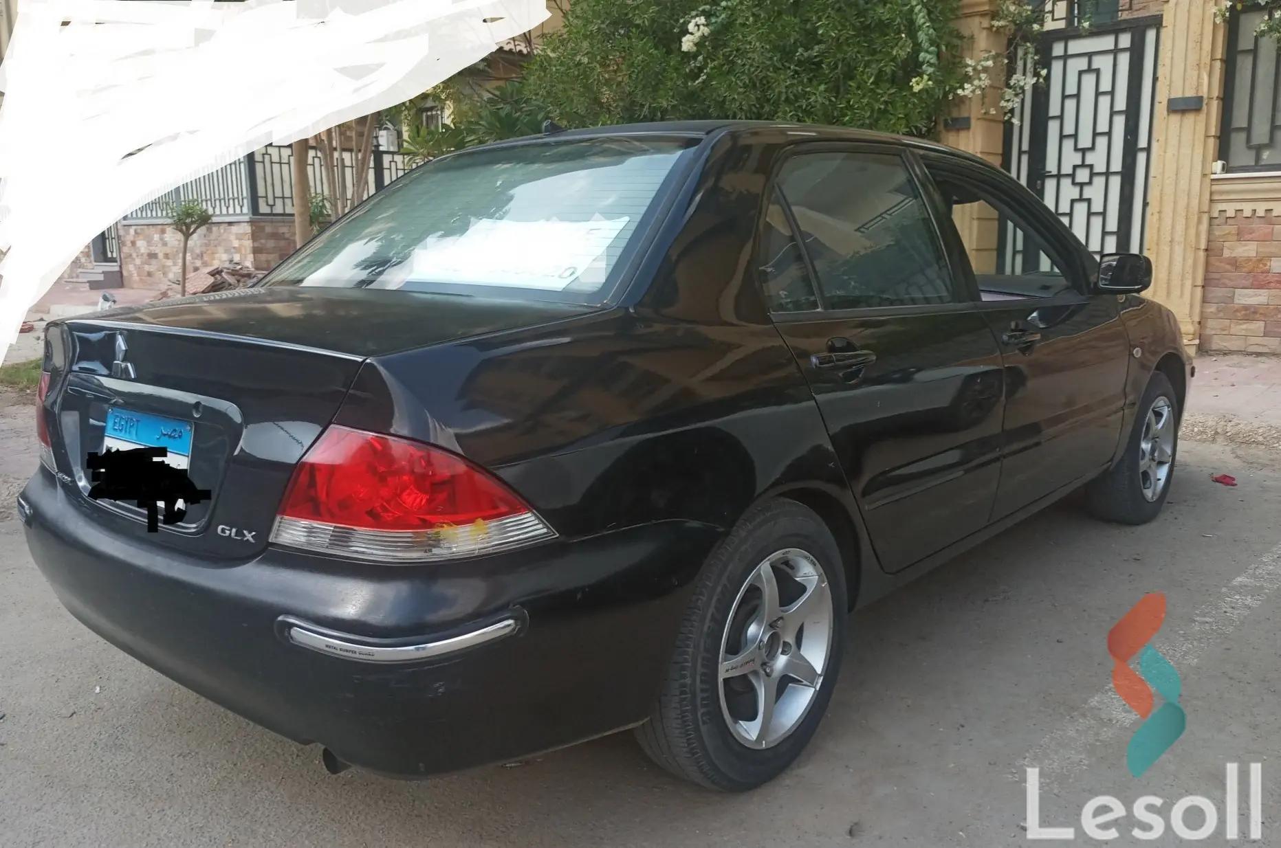 Mitsubishi lancer automatic used black model 2013