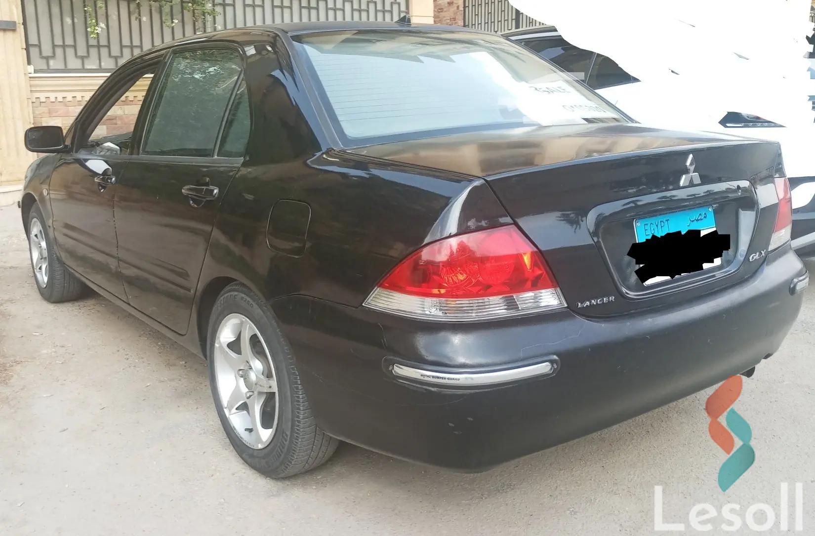 Mitsubishi lancer automatic used black model 2013