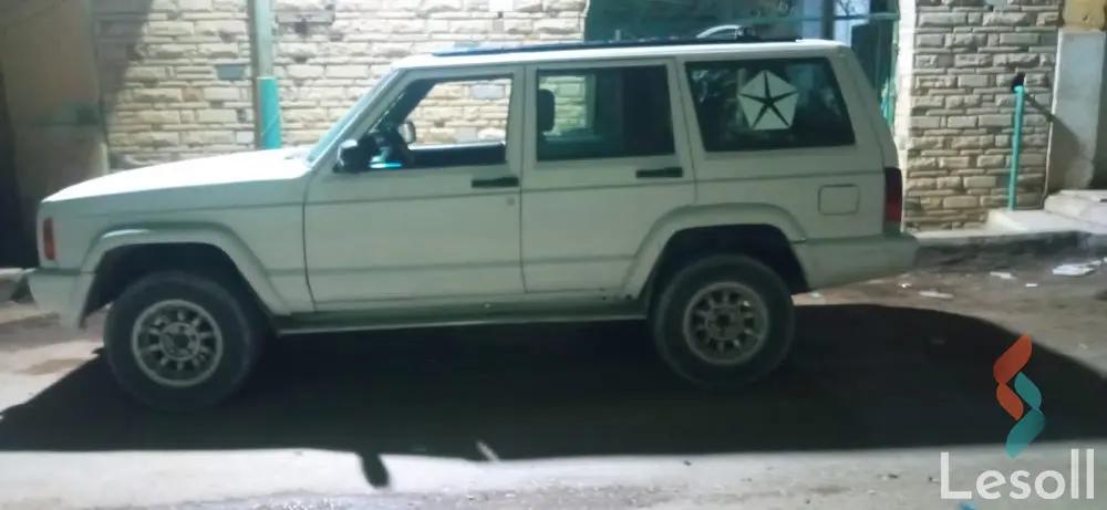 جيب شيروكي مانيوال مستعملة أبيض موديل 1998 - الصورة الرئيسية