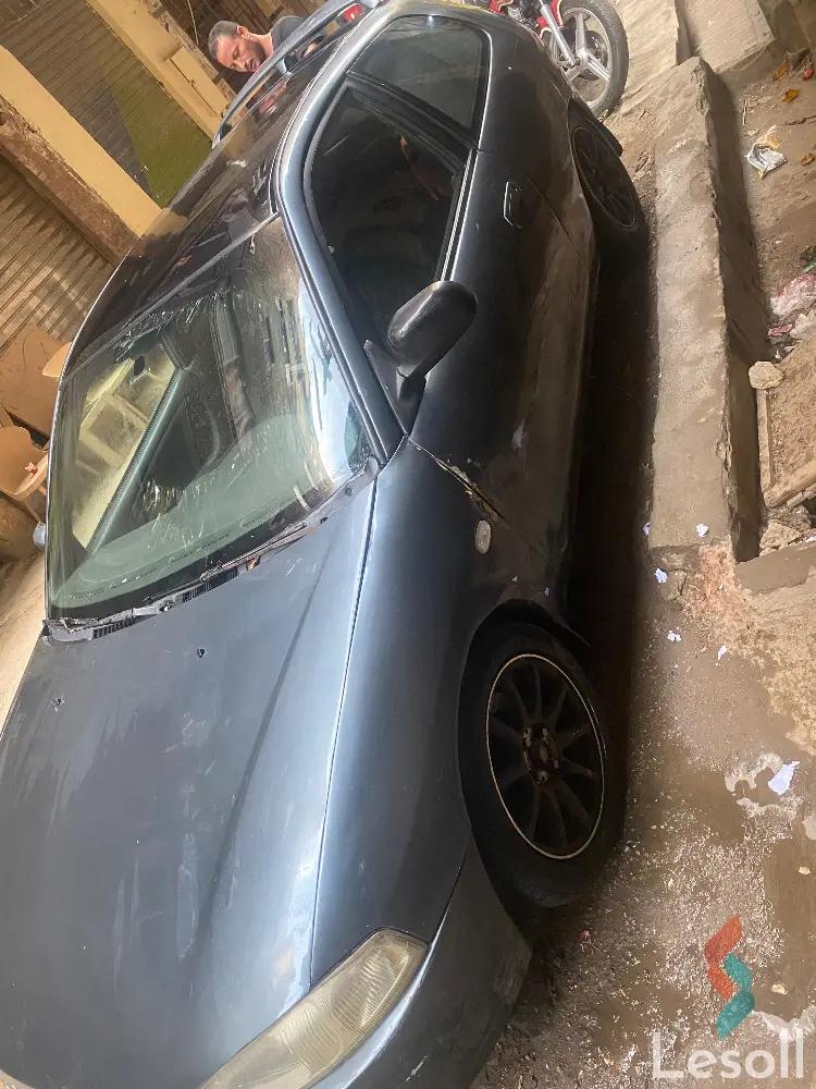 ميتسوبيشي ميراج اوتوماتك مستعملة فضي موديل 1996 - صورة 3