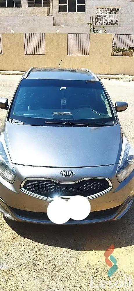 Kia carens automatic used silver model 2014 - Image 2