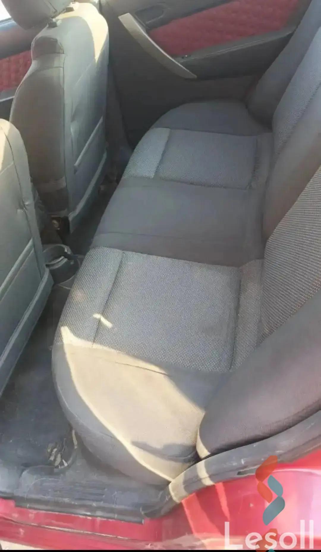 شيفروليه افيو مانيوال مستعملة أحمر موديل 2011 - صورة 2