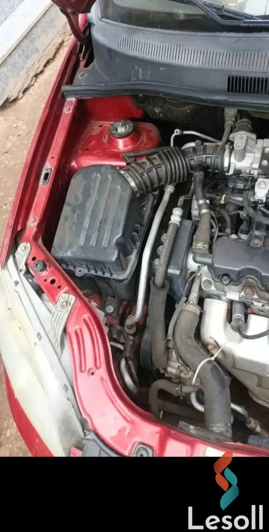 شيفروليه افيو مانيوال مستعملة أحمر موديل 2011 - كل الصور