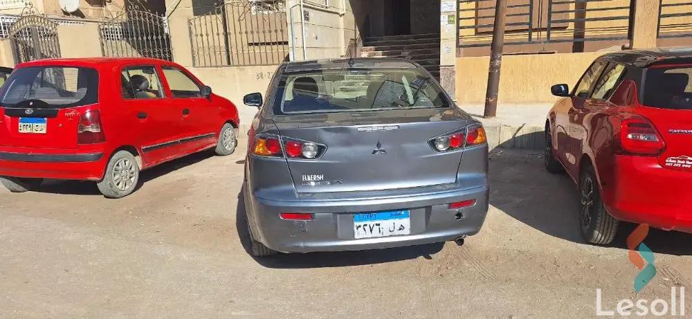 ميتسوبيشي لانسر اوتوماتك مستعملة رمادي داكن موديل 2015