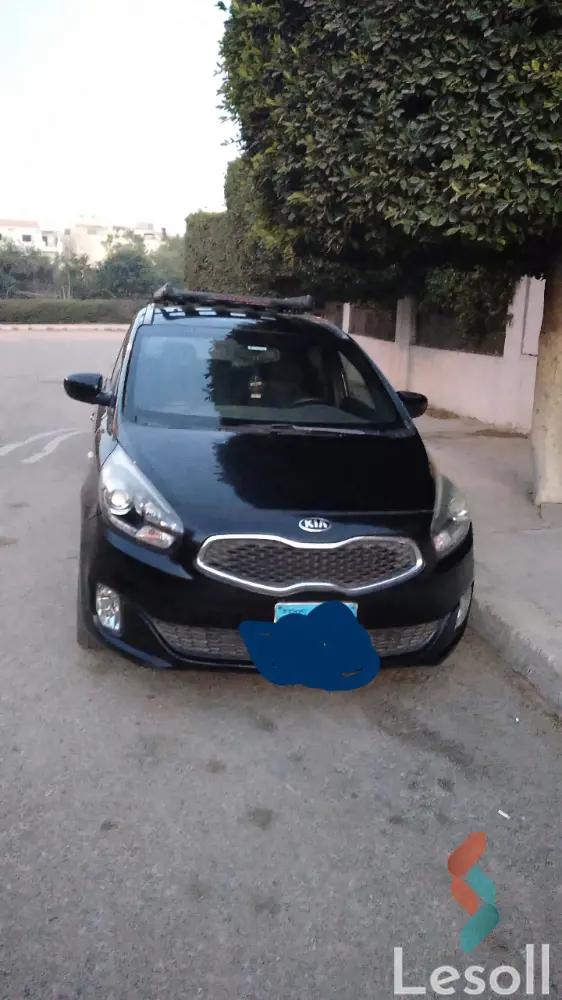 كيا كارينز اوتوماتك مستعملة أسود موديل 2016 - الصورة الرئيسية