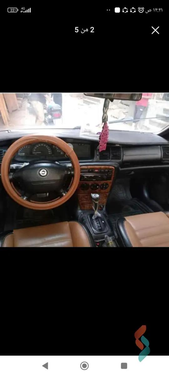 أوبل فكترا اوتوماتك مستعملة فضي موديل 1998 - صورة 2