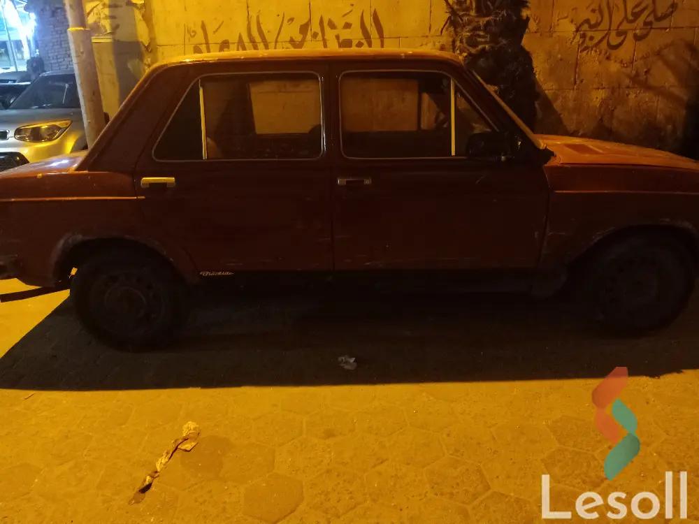 فيات 128 مانيوال مستعملة أحمر موديل 1975 - صورة 4