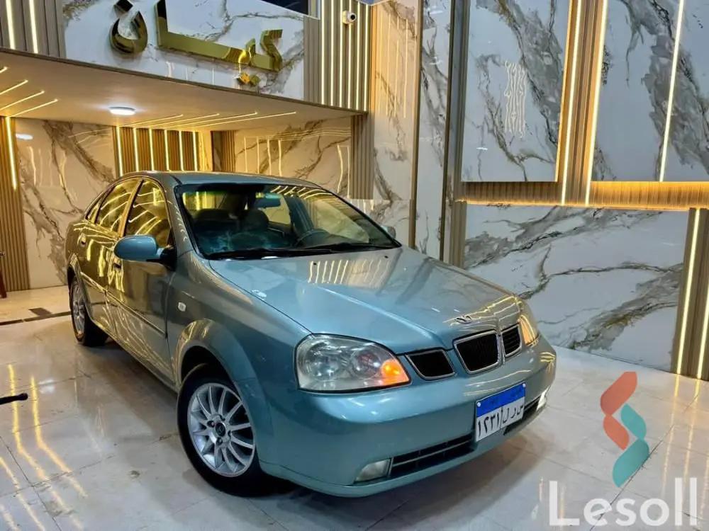 دايو ريزر اوتوماتك مستعملة فيروزي موديل 2003 - صورة 4