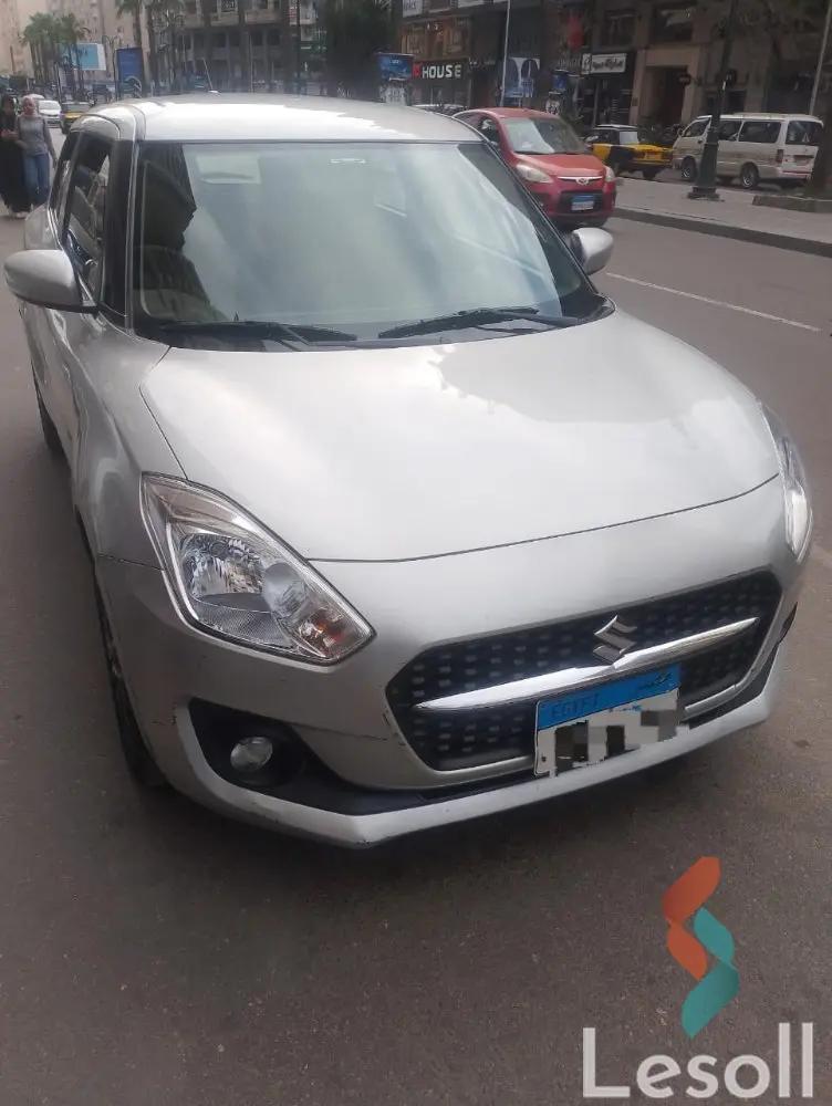 Suzuki swift automatic used silver model 2021