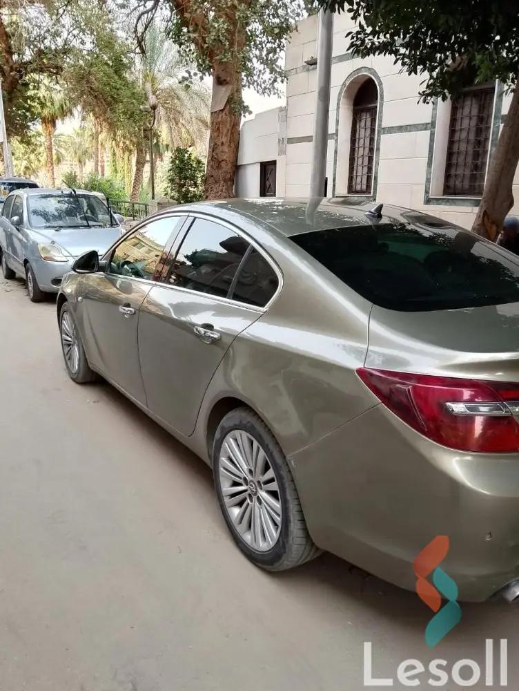 أوبل إنسيجنيا اوتوماتك مستعملة ذهبي موديل 2014