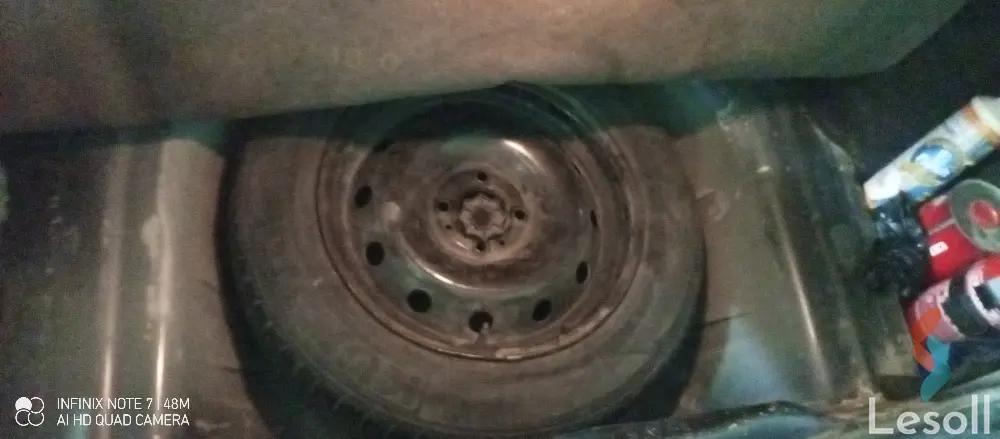 رينو لوجان مانيوال مستعملة رمادي داكن موديل 2012