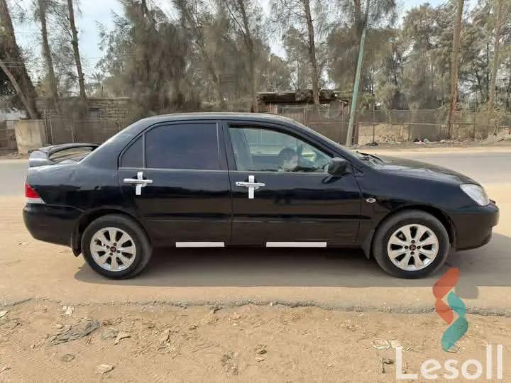 ميتسوبيشي لانسر اوتوماتك مستعملة أسود موديل 2007 - الصورة الرئيسية