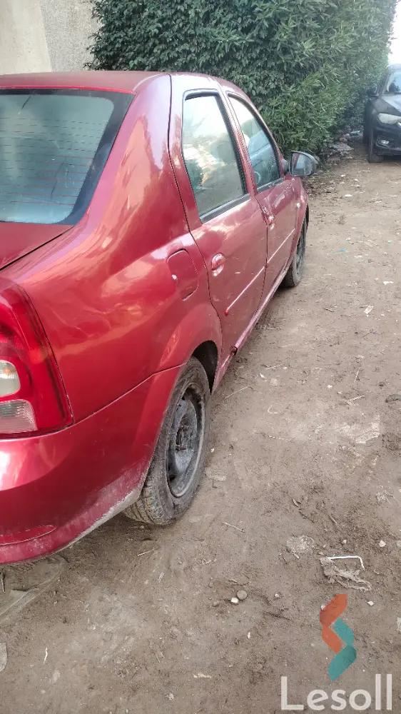 رينو لوجان مانيوال مستعملة أحمر موديل 2010