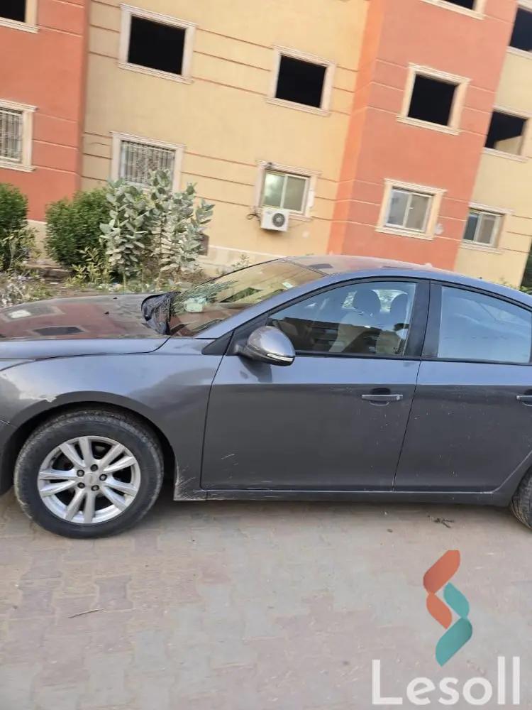 شيفروليه كروز اوتوماتك مستعملة رمادي داكن موديل 2015 - الصورة الرئيسية