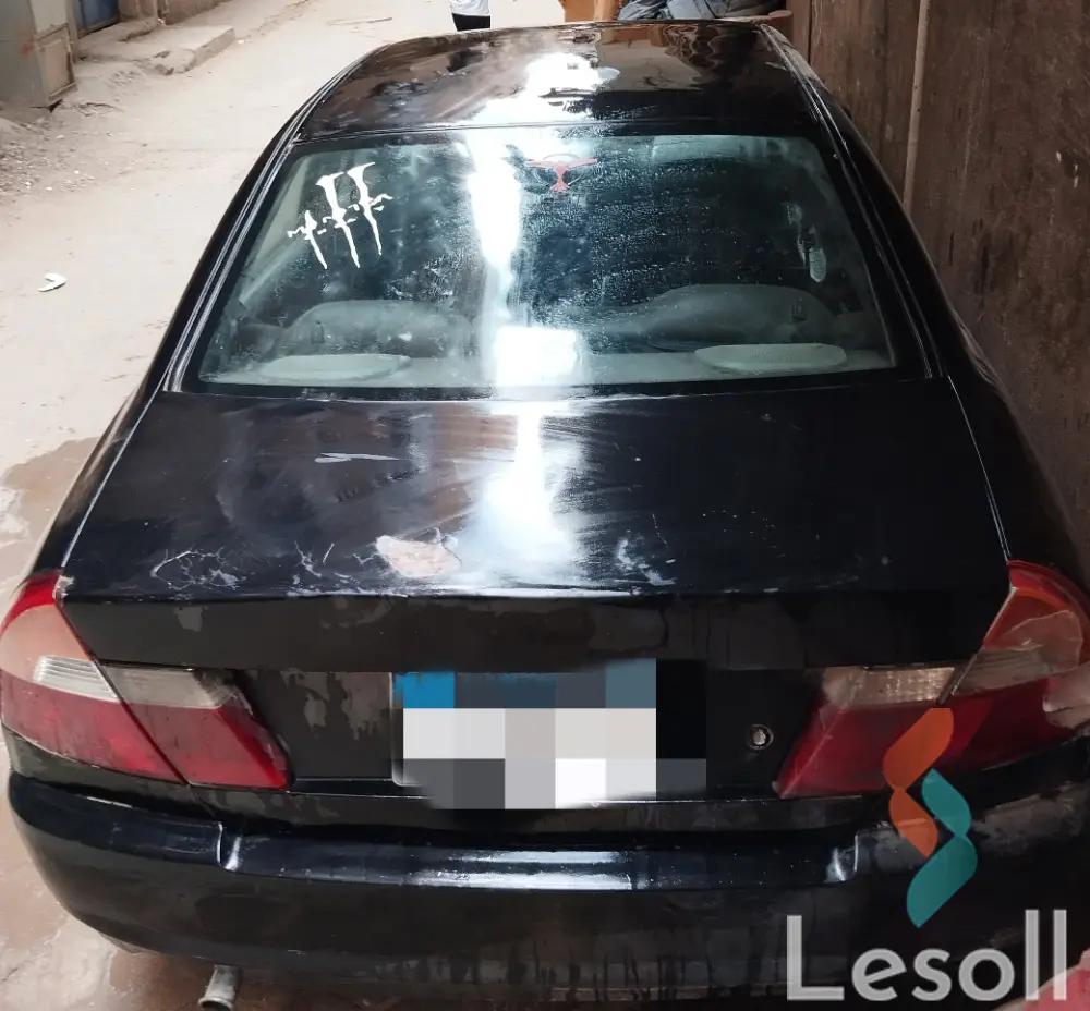 Mitsubishi lancer manual used black model 1999 - Image 2