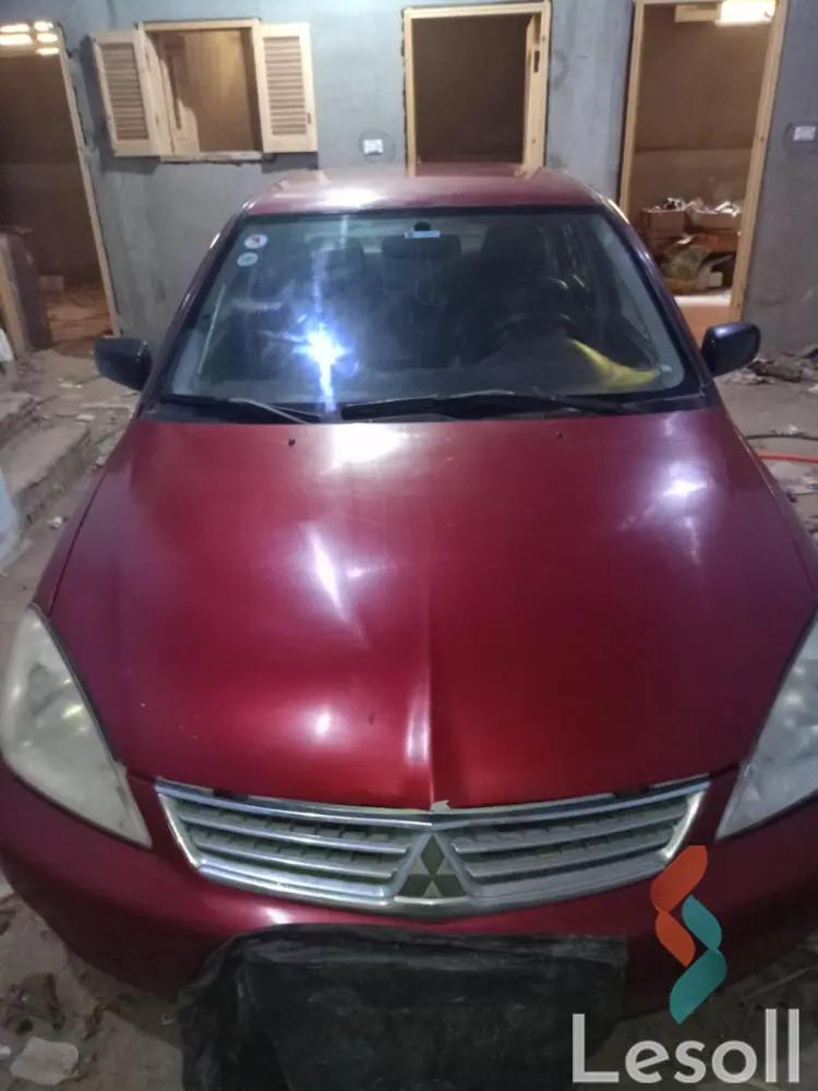 ميتسوبيشي لانسر اوتوماتك مستعملة أحمر موديل 2007