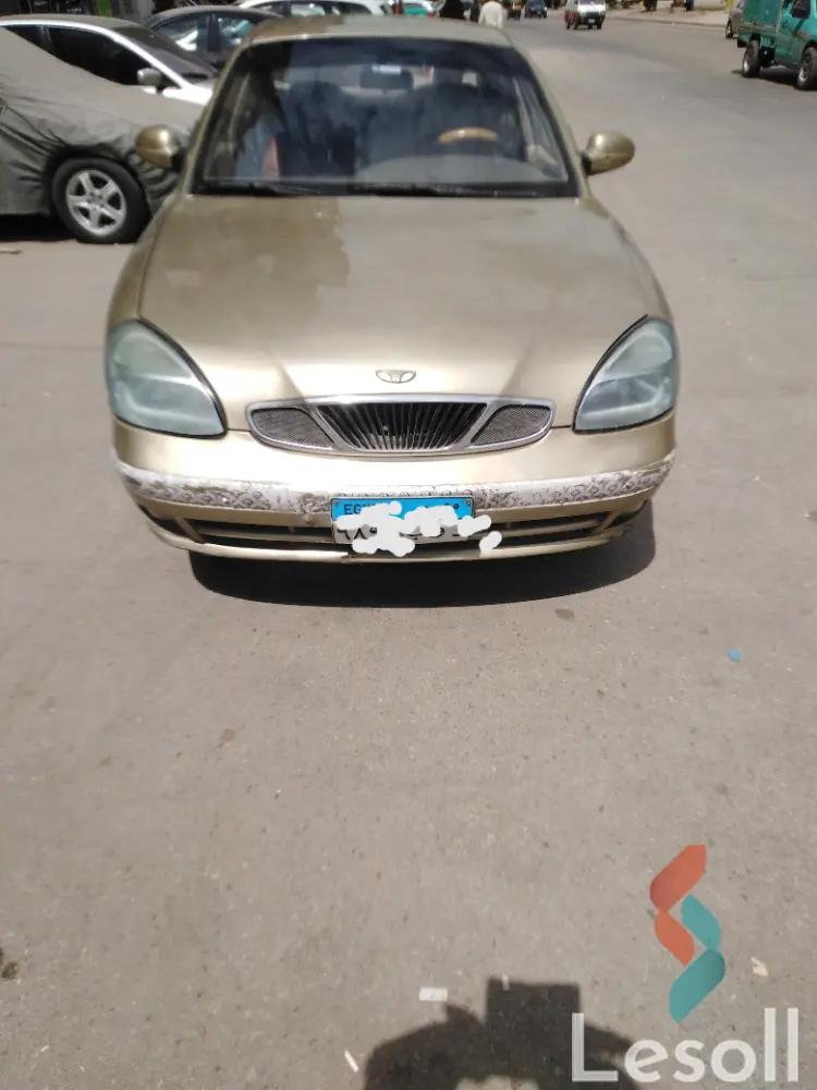 دايو نوبيرا مانيوال مستعملة ذهبي موديل 2000 - الصورة الرئيسية