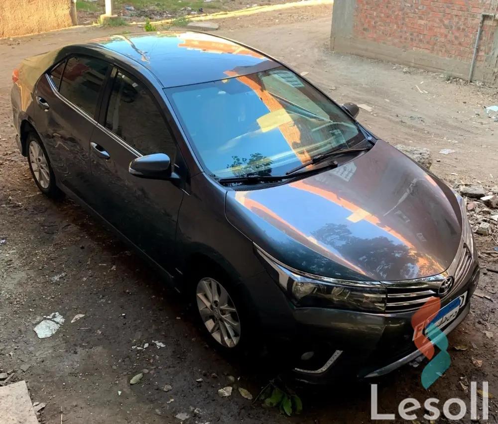 تويوتا كورولا اوتوماتك مستعملة رمادي داكن موديل 2015 - الصورة الرئيسية