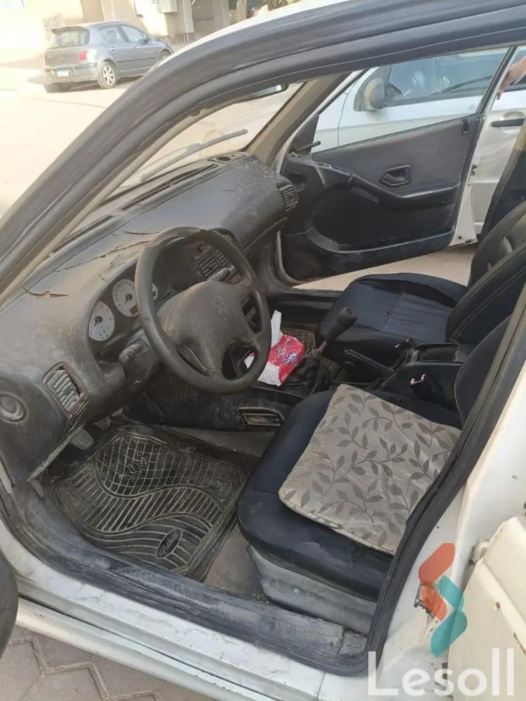 بيجو 405 مانيوال مستعملة أبيض موديل 2010