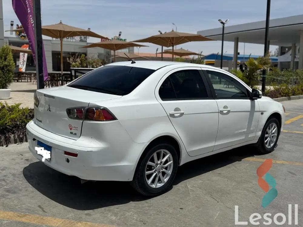 ميتسوبيشي لانسر اوتوماتك مستعملة أبيض موديل 2015 - كل الصور