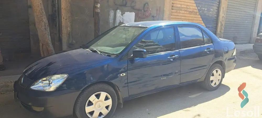 ميتسوبيشي لانسر مانيوال مستعملة كحلي موديل 2008