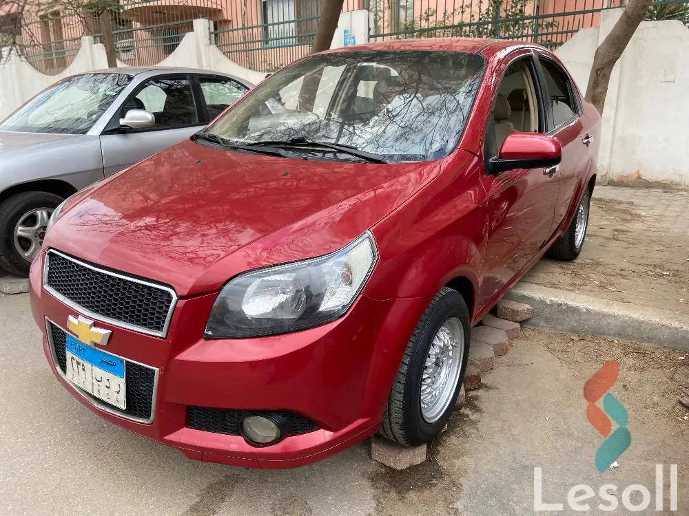 شيفروليه افيو اوتوماتك مستعملة أحمر موديل 2015 - صورة 2