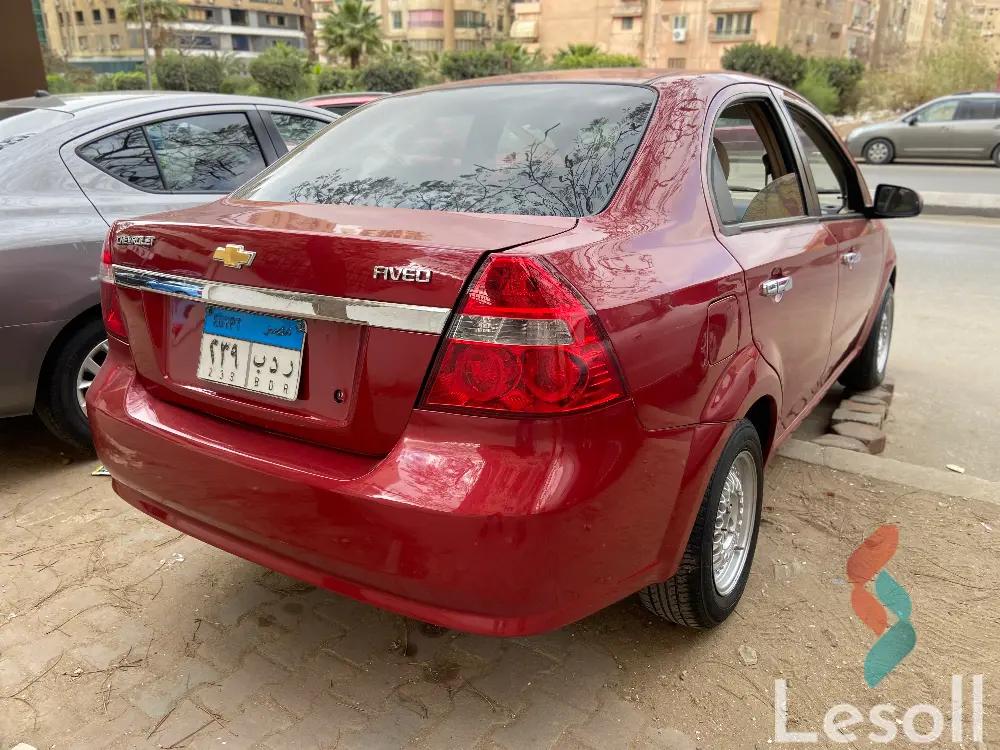 شيفروليه افيو اوتوماتك مستعملة أحمر موديل 2015 - كل الصور