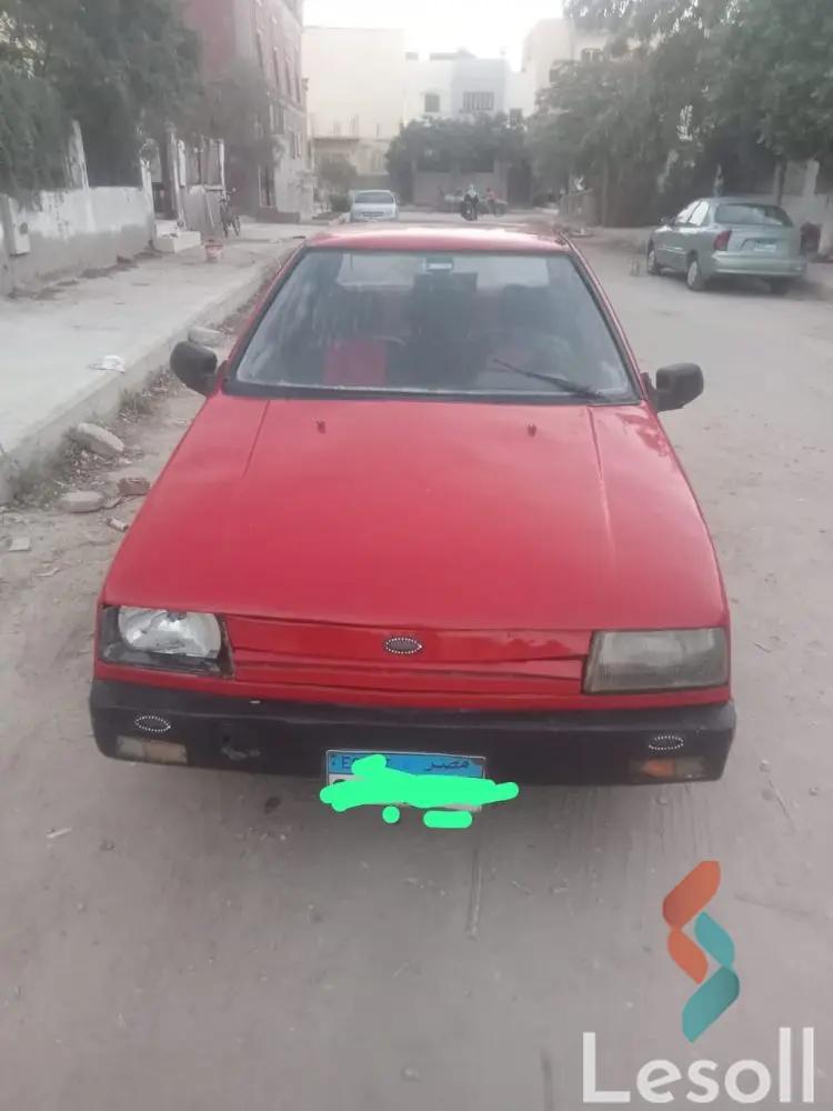 ميتسوبيشي لانسر مانيوال مستعملة أحمر موديل 1984