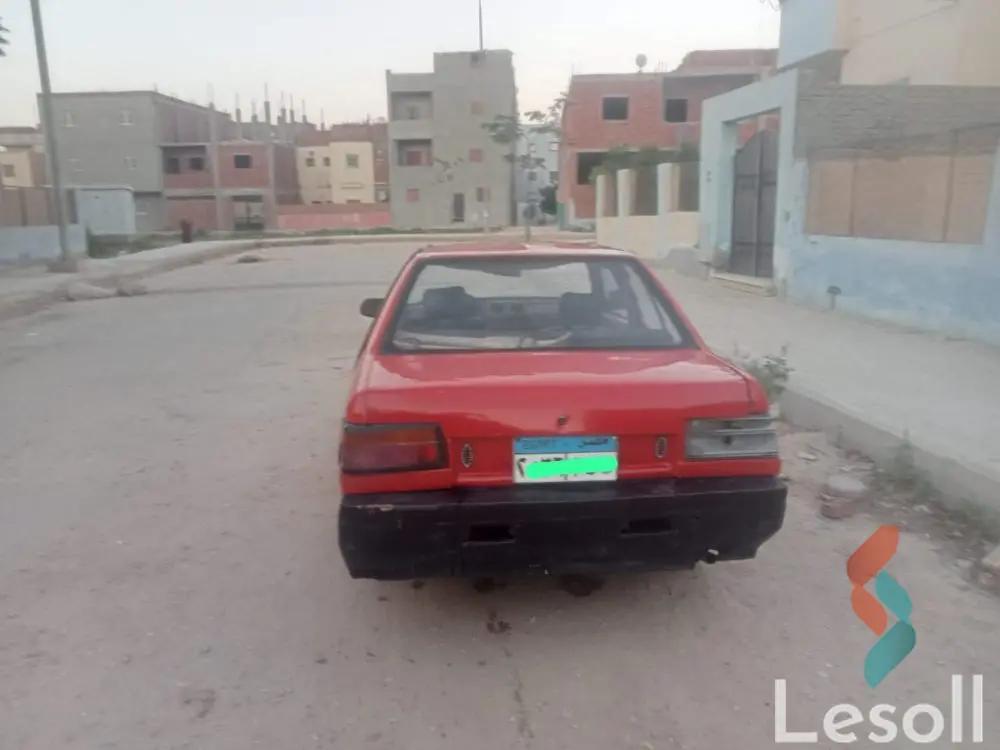 ميتسوبيشي لانسر مانيوال مستعملة أحمر موديل 1984