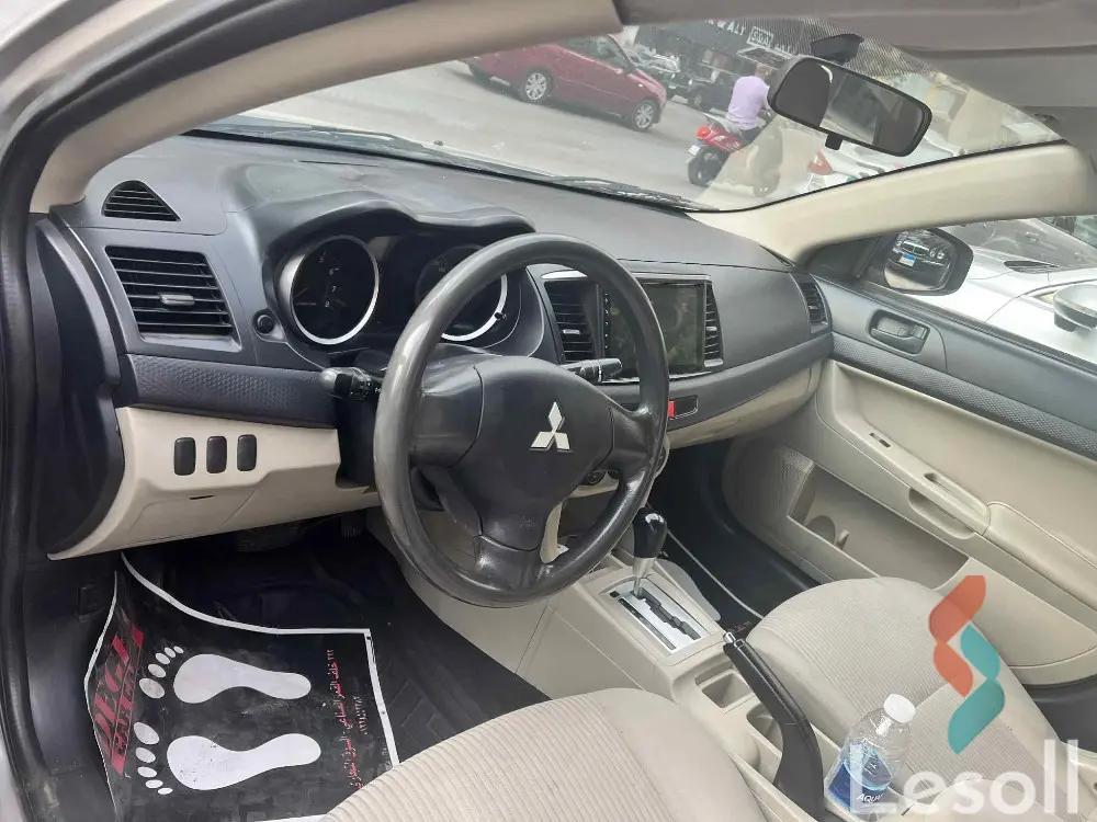 ميتسوبيشي لانسر اوتوماتك مستعملة فضي موديل 2016 - كل الصور