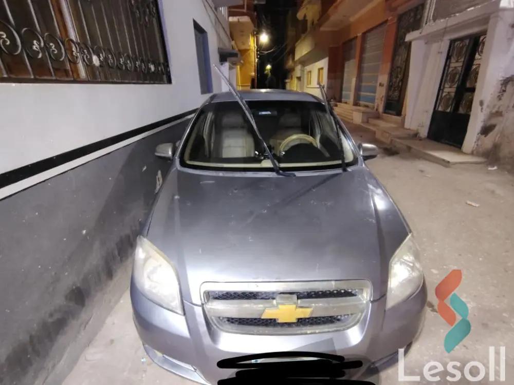 شيفروليه افيو اوتوماتك مستعملة فضي موديل 2013 - صورة 2