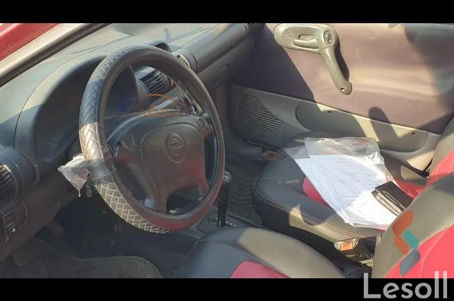 أوبل كورسا مانيوال مستعملة أحمر موديل 1998