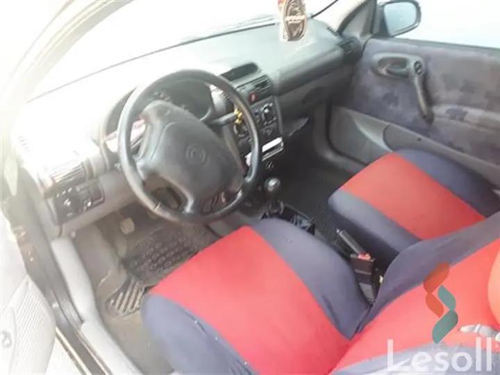 أوبل كورسا مانيوال مستعملة أحمر موديل 1998